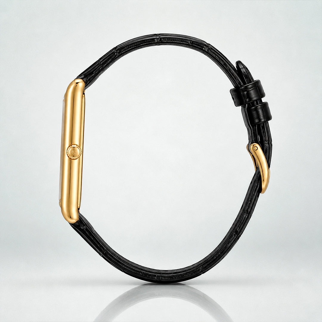 Side profile of the 1962 gold tank case and black crocodile-embossed genuine leather strap