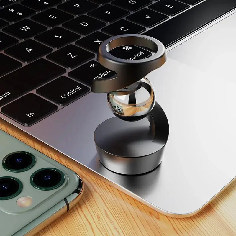 Kinetic Desk Gadget Featuring Floating Gravity