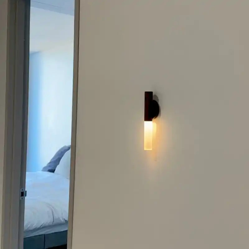 Rechargeable sensor wall light — mounted outside a bedroom doorway
