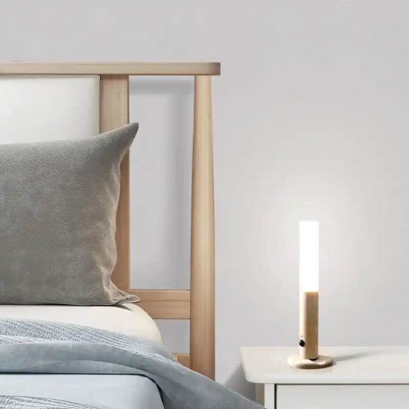Rechargeable sensor wall light — placed upright as a bedside table lamp