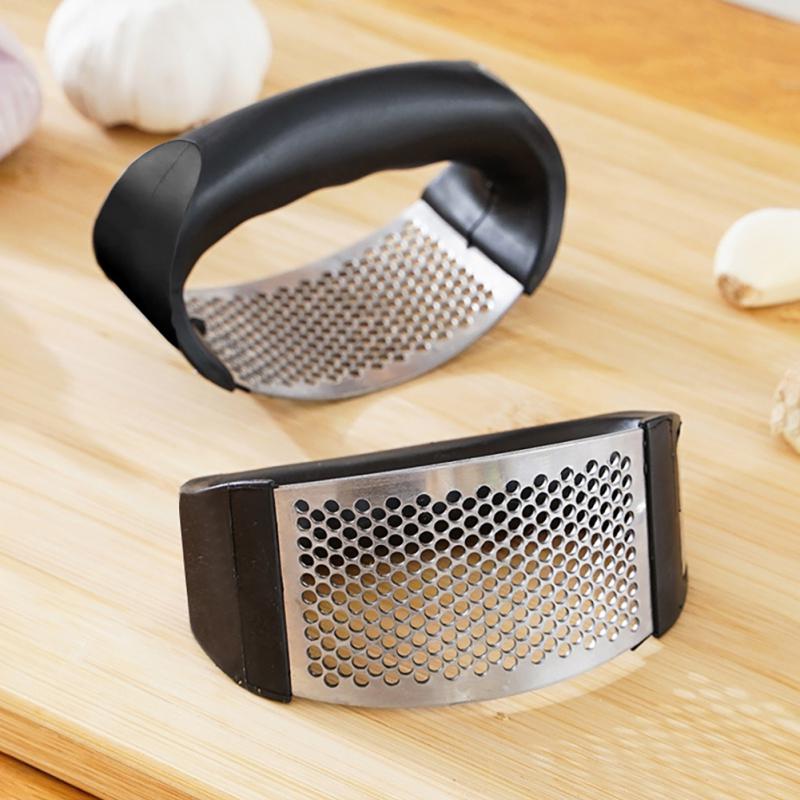 VEGETABLE PRESS™ | STAINLESS STEEL MANUAL PRESS FOR GARLIC AND VEGETABLES.