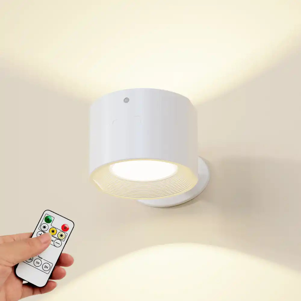 LED rechargeable wall sconce — in white, shown with included remote control