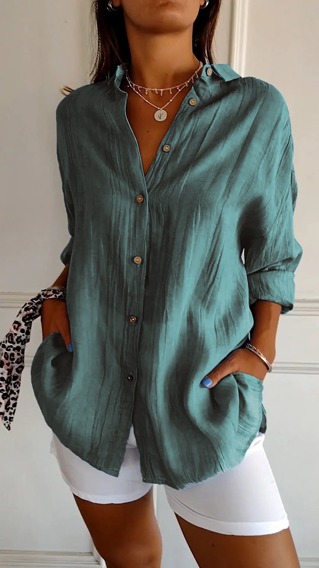 Chic women's blouse with pleated details and a light cut