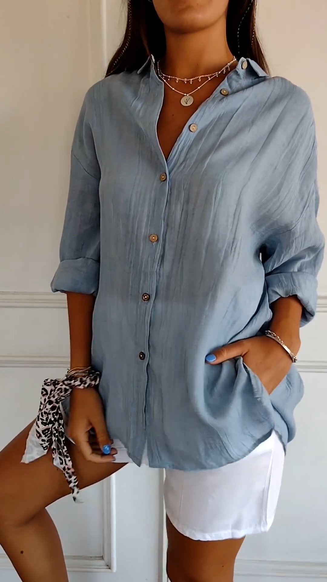 Chic women's blouse with pleated details and a light cut