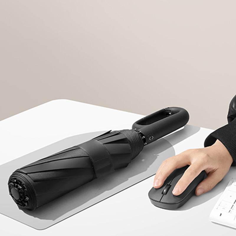 Compact Folding Umbrella with UV Protection for Sun and Rain
