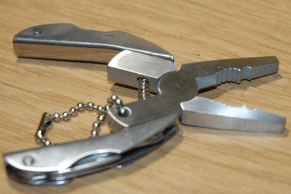 Folding Multi-Function Tool with Portable Design